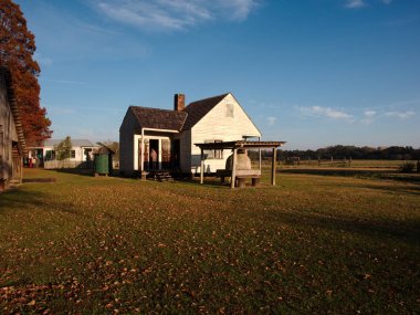 Baton Rouge, Louisiana, USA - 2019: A cabin at LSU Rural Life Museum, an outdoor museum of Louisiana history. clipart