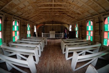 Baton Rouge, Louisiana, USA - 2019: Church interior at LSU Rural Life Museum, an outdoor museum of Louisiana history. clipart