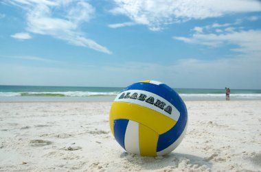 A volleyball on the beach at Gulf State Park, Gulf Shores, Alabama, USA. clipart