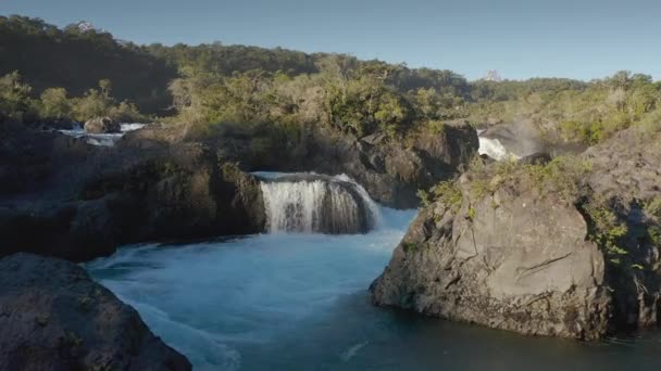 Air close view of the water forces of the Petrohue Falls - Puerto Varas, Chile, Jižní Amerika. — Stock video