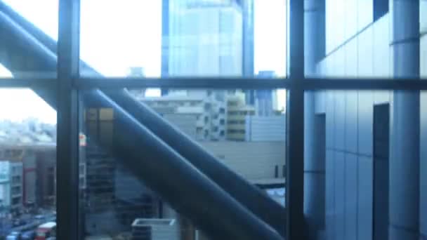 東京都中野区中野坂上 2018 そのビジネス街でエレベーターから市内に位置します カメラ キヤノン Eos Mark4 — ストック動画