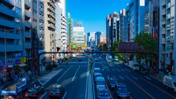 Timelapse muitos carros perto do edifício na rua em Shibuya Tóquio — Vídeo de Stock