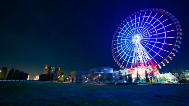 Rueda de la fortuna por la noche en Odaiba Tokyo time lapse — Vídeo de stock