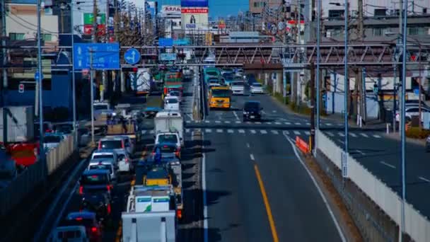 Carros apressados no centro da rua em Tóquio daytime timelapse tiro do meio — Vídeo de Stock