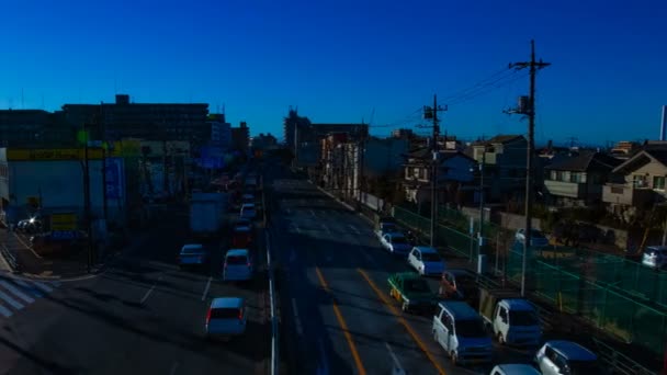 Auto in corsa per la strada del centro di Tokyo di giorno timelapse ampio colpo — Video Stock