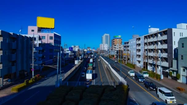 도쿄 의 도심 거리에서 돌진 자동차 타임 랩스 와이드 샷 — 비디오
