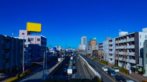 도쿄 의 도심 거리에서 돌진 자동차 타임 랩스 와이드 샷 — 비디오