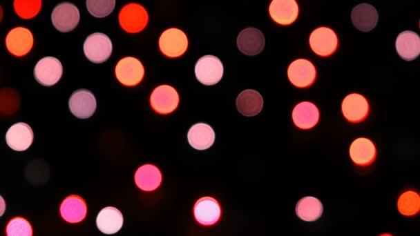 Cámara colorida bokeh desfocus por la noche — Vídeos de Stock