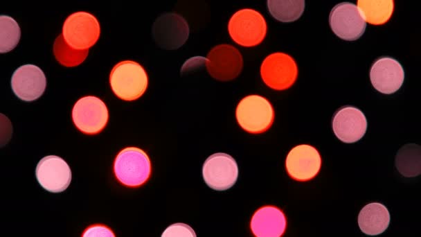 Cámara colorida bokeh desfocus por la noche — Vídeos de Stock