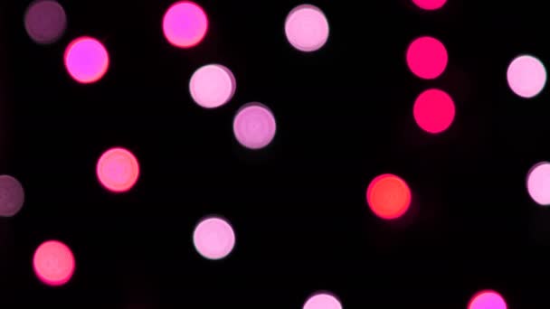 Cámara colorida bokeh desfocus por la noche — Vídeos de Stock