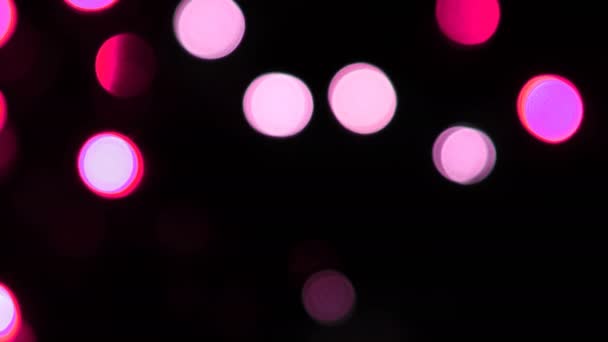 Cámara colorida bokeh desfocus por la noche — Vídeos de Stock