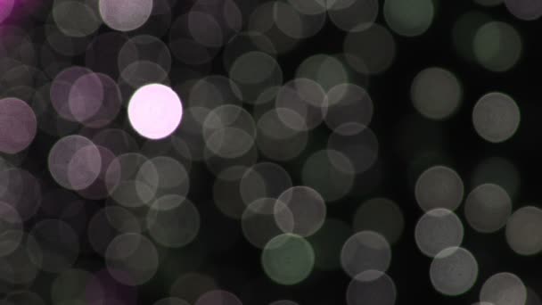 Cámara colorida bokeh desfocus por la noche — Vídeos de Stock