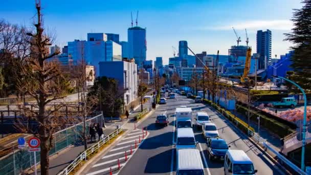 Un timelapse de la calle cerca de la construcción en la ciudad de negocios en Tokio — Vídeo de stock