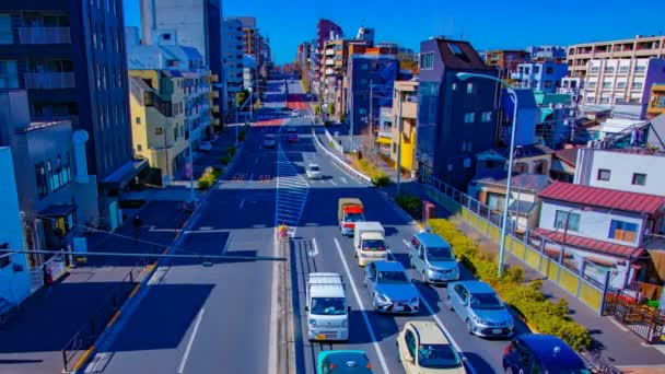 Un timelapse della strada della città nel centro di Tokyo panning a tutto campo diurno — Video Stock
