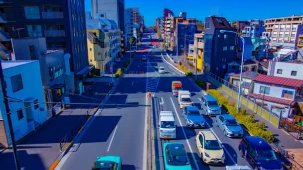 Een timelapse van de stad straat in de binnenstad in Tokio overdag Wide shot zoom — Stockvideo