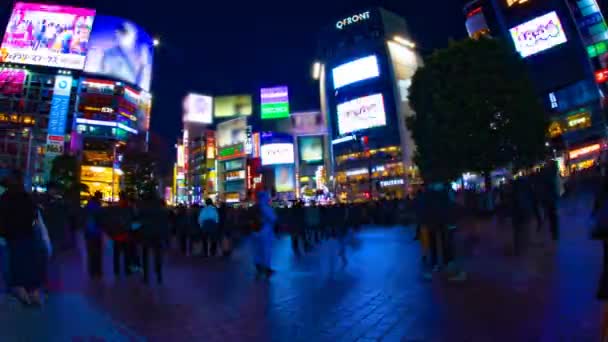 Noche lapso de cruce en la ciudad de neón en Shibuya Tokio tiro ancho — Vídeo de stock