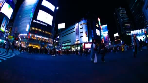 Night time lapse Crossing in de neon stad in Shibuya Tokyo Wide shot — Stockvideo