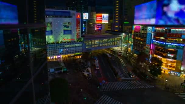 Night timelapse Crossing in de neon stad in Shibuya Tokyo hoge hoek breed schot — Stockvideo