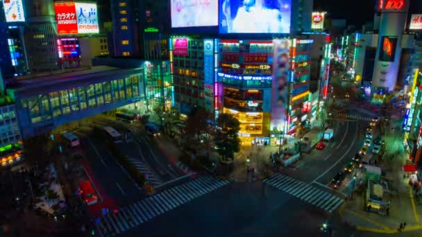 Night timelapse Crossing in de neon stad in Shibuya Tokyo hoge hoek breed schot — Stockvideo