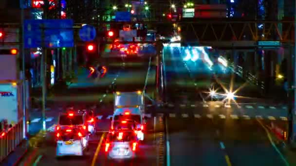 Sebuah timelapse jalan di pusat kota di Tokyo pada malam hari eksposur tengah tembakan — Stok Video