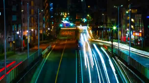 A timelapse da rua no centro de Tóquio à noite exposição longa tiro do meio — Vídeo de Stock