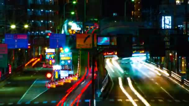 Tokyo şehir merkezinde sokak bir timelapse gece uzun pozlama orta çekim — Stok video