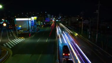 Tokyo şehir merkezinde sokak bir timelapse gece uzun pozlama geniş çekim