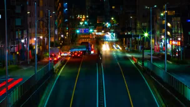 Tokyo şehir merkezinde sokak bir timelapse gece uzun pozlama orta çekim — Stok video