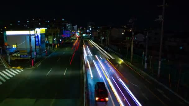 Un timelapse della strada al centro di Tokyo di notte esposizione lunga ampia colpo — Video Stock