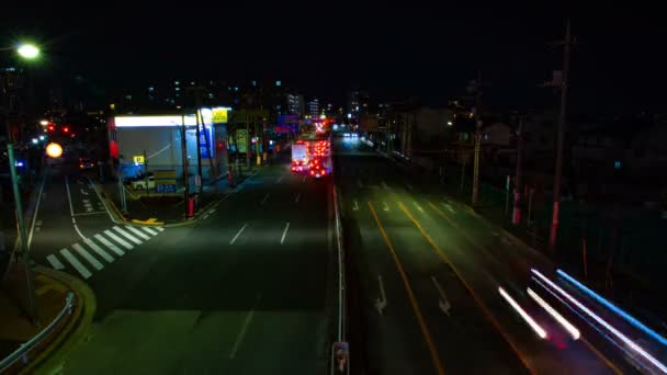 Боязкою вулиці в центрі міста в Токіо вночі довгий експозиції широкий постріл — стокове відео