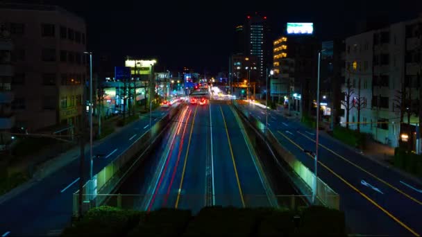 Zeitraffer der Straße in der Innenstadt von Tokio in der Nacht Langzeitbelichtung Weitwinkel — Stockvideo