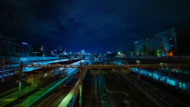 Gece çapında çekim De Ueno istasyonunda trenin bir timelapse — Stok video