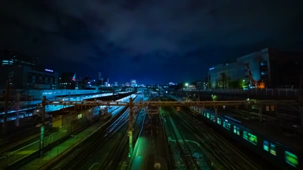 A timelapse of the train at Ueno station at night wide shot — Stock Video