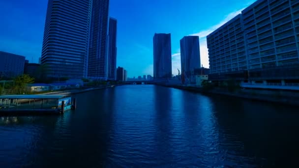 Ein Zeitraffer des Sonnenuntergangs in der Nähe des Bajarea in der Geschäftsstadt in ariake tokyo — Stockvideo