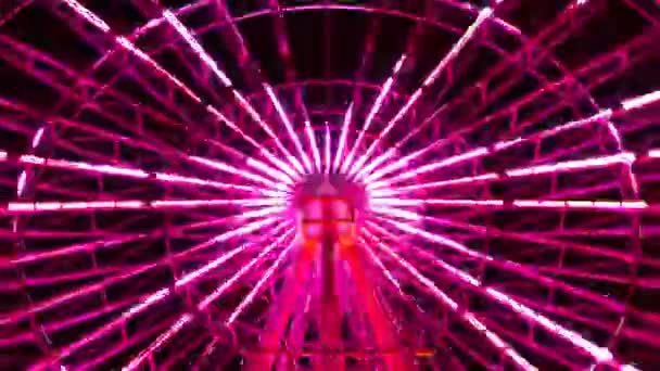 Sebuah tiLapse roda Ferris di taman hiburan di Tokyo pada malam hari — Stok Video