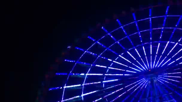 Et time-lapse af pariserhjul i forlystelsesparken i Tokyo om natten – Stock-video