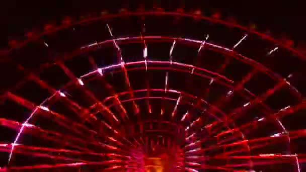 Тімиз чортове колесо в парку атракціонів в Токіо вночі — стокове відео