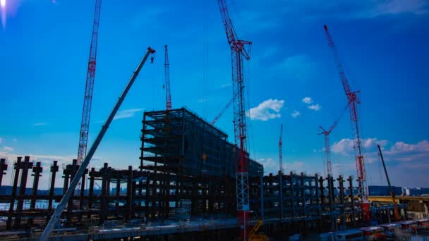 A timelapse of cranes at the under construction in Tokyo — Stock Video