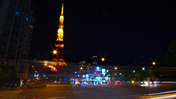 Время на переходе за высокой башней в Токио — стоковое видео