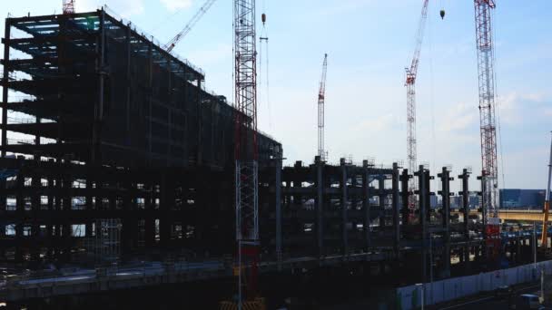Guindastes em construção em Tóquio — Vídeo de Stock