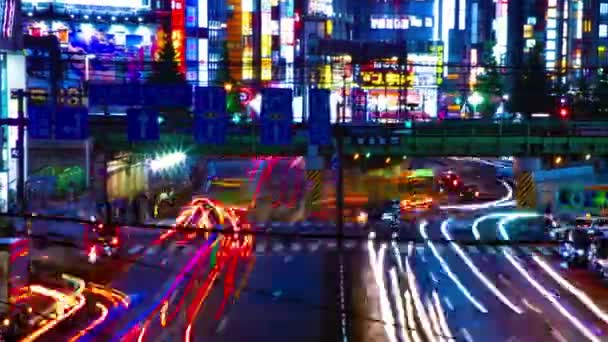 Een timelapse van de straat in de neon stad in Shinjuku Tokyo Wide shot — Stockvideo