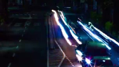 Tokyo'da Oume caddesinde şehir caddesinin bir timelapse uzun pozlama geniş çekim