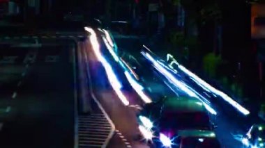 Tokyo'da Oume caddesinde şehir caddesinin bir timelapse uzun pozlama geniş çekim