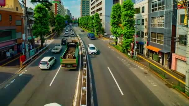 Таймце в центрі міста на проспекті Kanpachi в Токіо денний широкий постріл — стокове відео