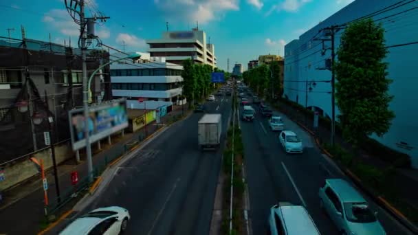 Een timelapse van Downtown Street op Kanpachi Avenue in Tokio overdag breed schot — Stockvideo