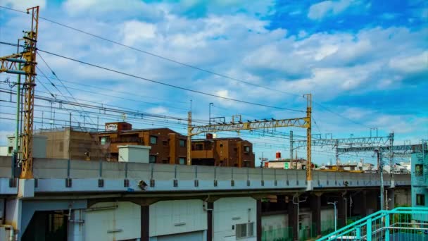 En timelapse av järnvägen i centrum i Tokyo dagtid — Stockvideo