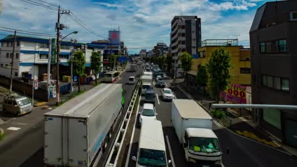 En timelapse av bil gata på Kanpachi avenyn i Tokyo dagtid bred skott — Stockvideo