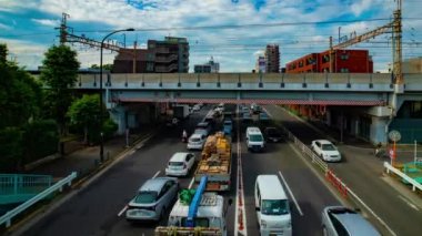 Tokyo 'da Kanpachi Bulvarı' ndaki otomobil sokağının zaman çizelgesi.