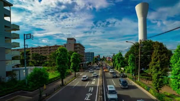 Un timelapse de la calle del coche en la avenida Kanpachi en Tokio de plano diurno — Vídeo de stock
