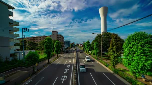 Un timelapse de la calle del coche en la avenida Kanpachi en Tokio de plano diurno — Vídeos de Stock